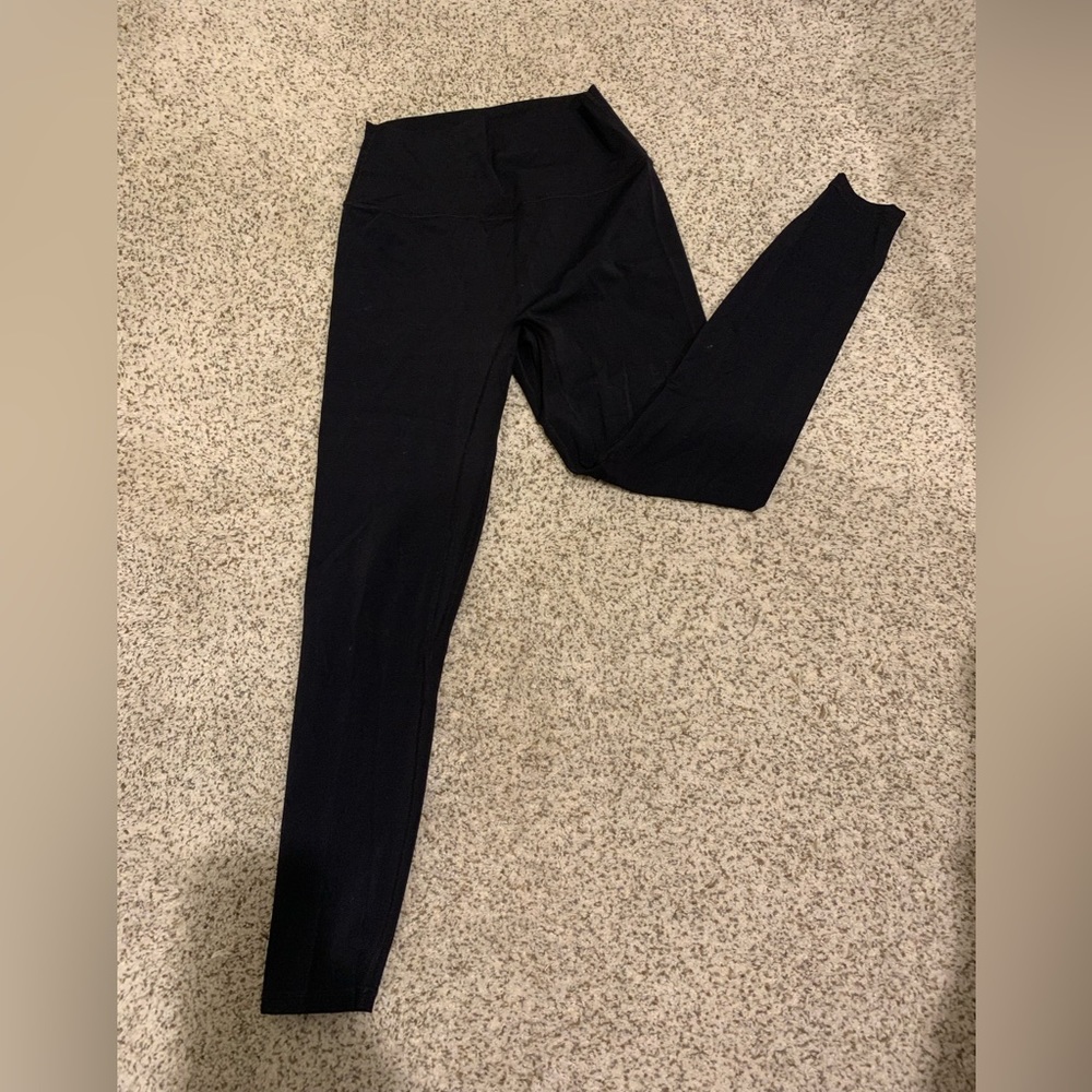 Level brand slick and lift black leggings size large